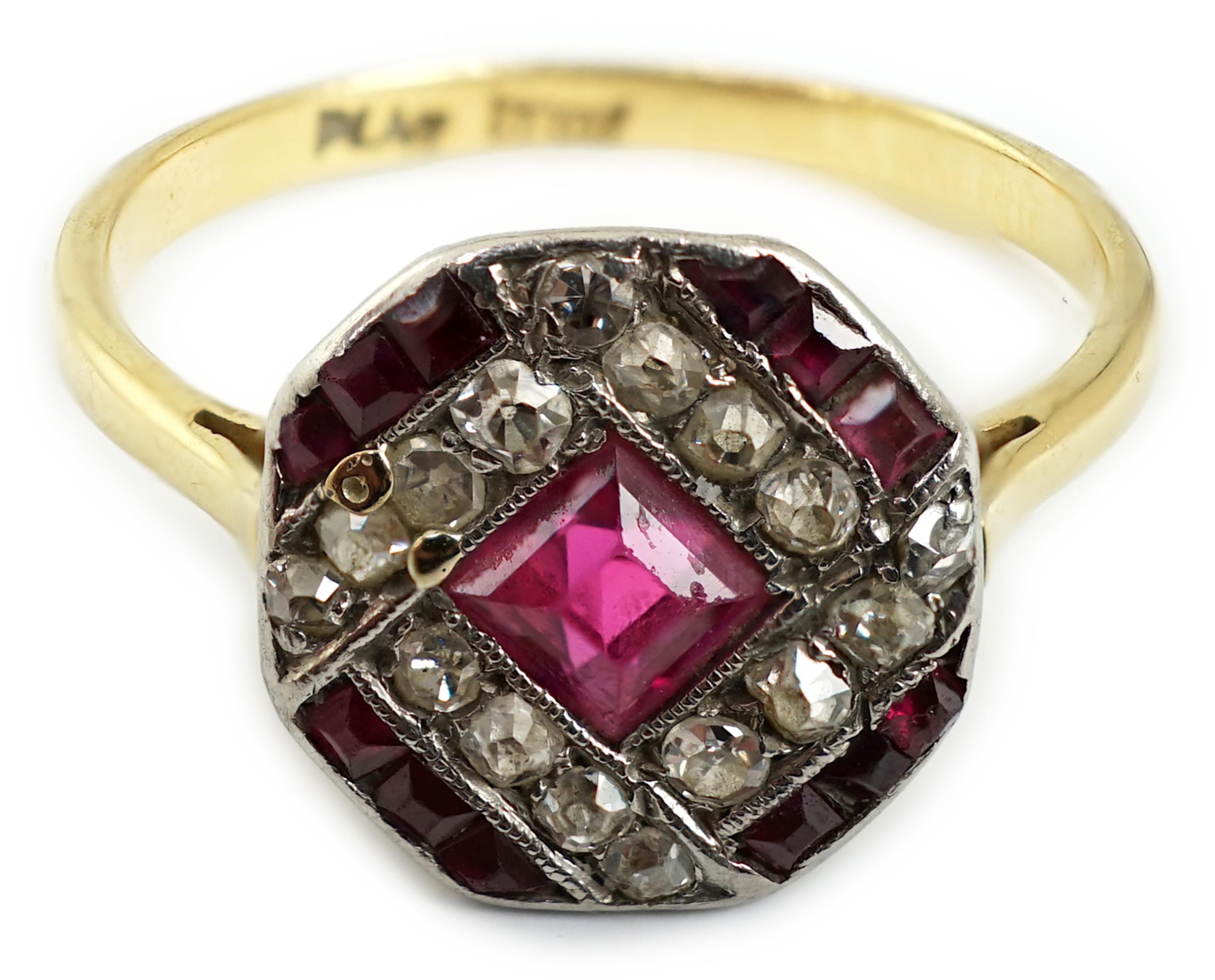 An Art Deco 18ct and platinum, ruby and diamond set octagonal cluster ring